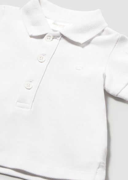 Polo recém nascido branco, menino