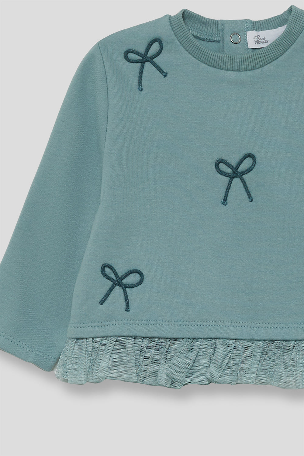 Camisola cardada com laço de menina